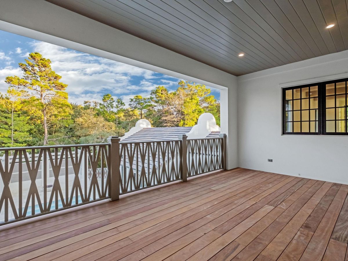 The terrace features a wooden deck and has a view of the surroundings.