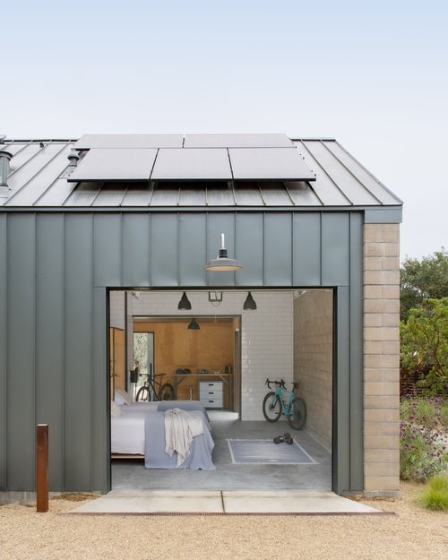 The garage is tiled similar to the bathrooms and can be converted to a cycling bunk house when needed - complete with a pair of custom built Murphy beds. 