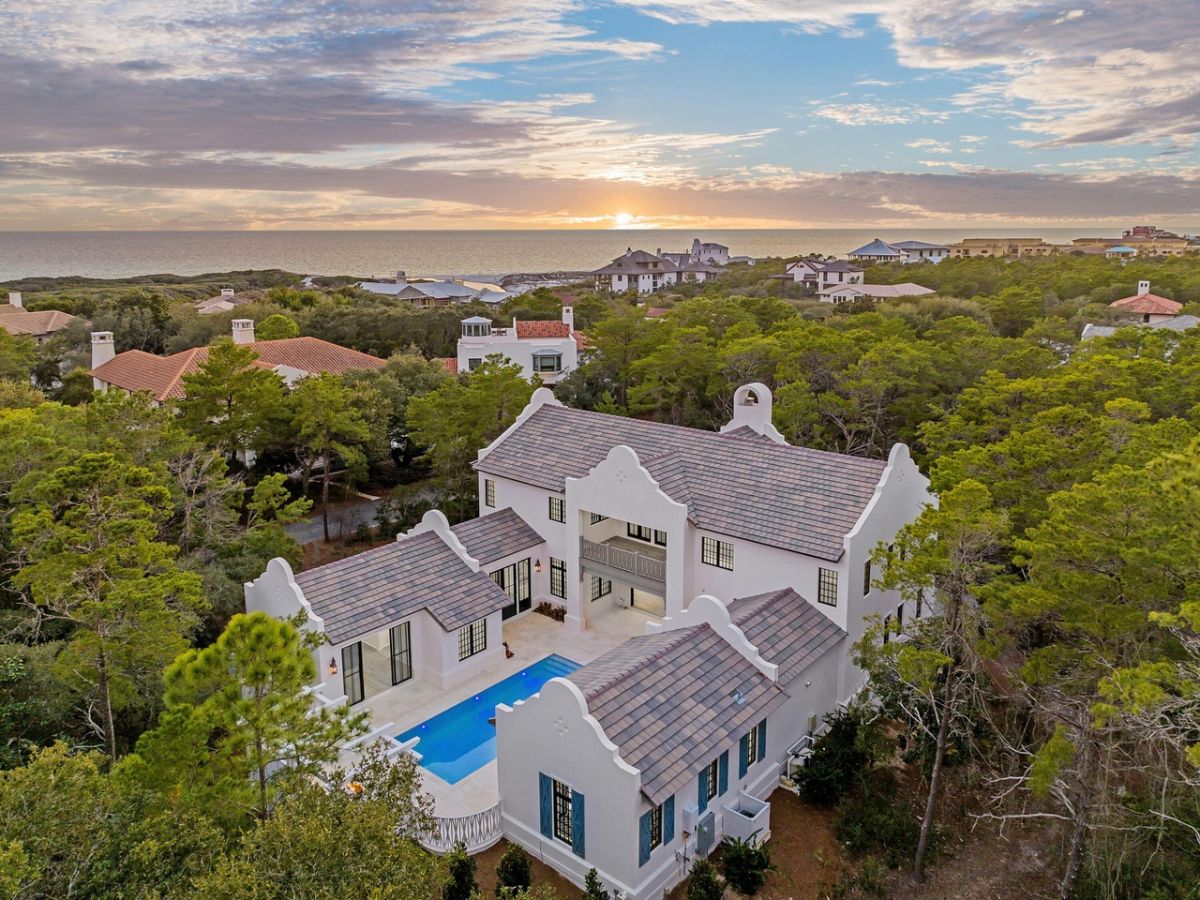 Coastal luxury adorns this Coastal Elements and Greg Jazayeri architectural masterpiece with appointments by Suzy Accola and Q Tile that is bounded by subtle brick paved streets and the natural privacy only offered by mature landscaping years in the making.