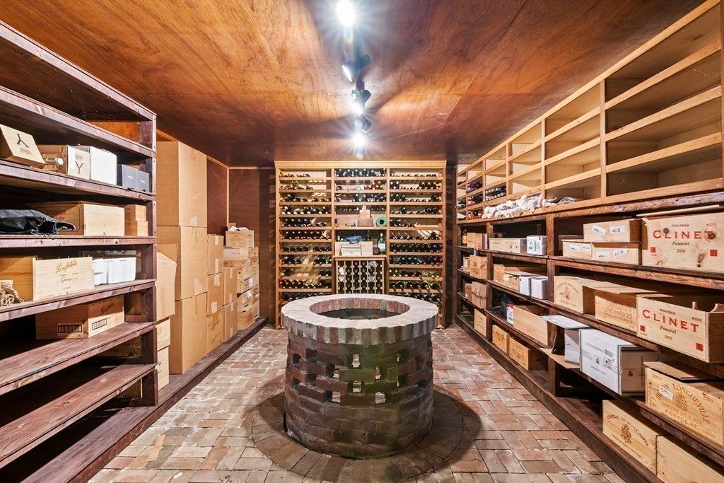 The house features a wine cellar and brick-lined well, giving a classic feel.