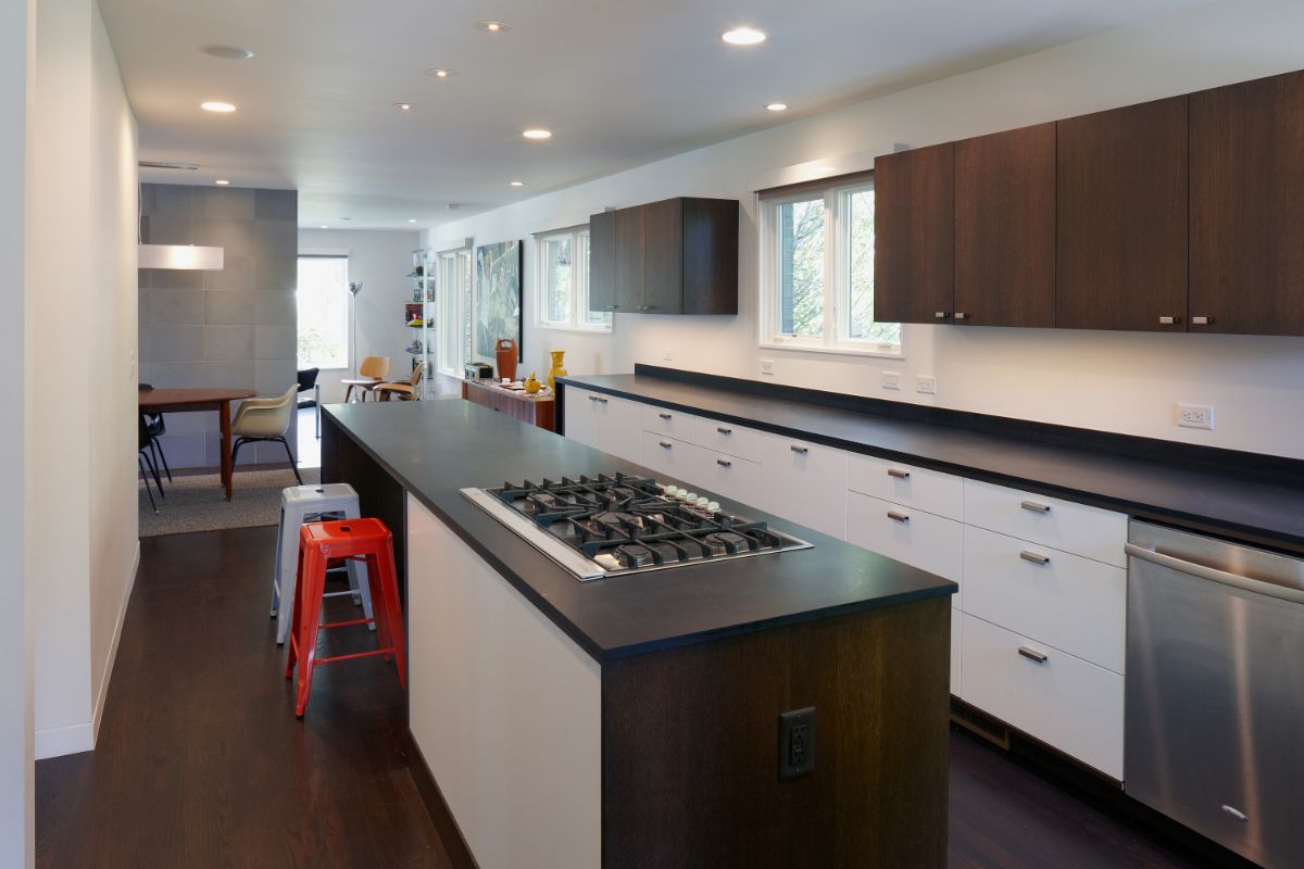 Paperstone countertops and custom cabinets outfit the kitchen. 