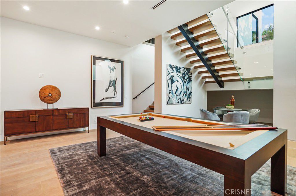 The house features a billiard table for recreation.