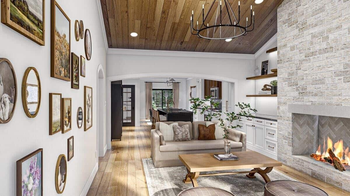 An open layout view of the great room and kitchen separated by an oversized archway.