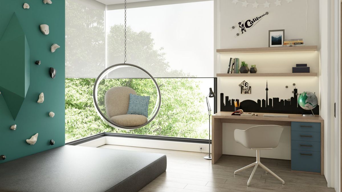 This bedroom has an ocean color scheme and includes a study table and hanging seats close to the glass walls.