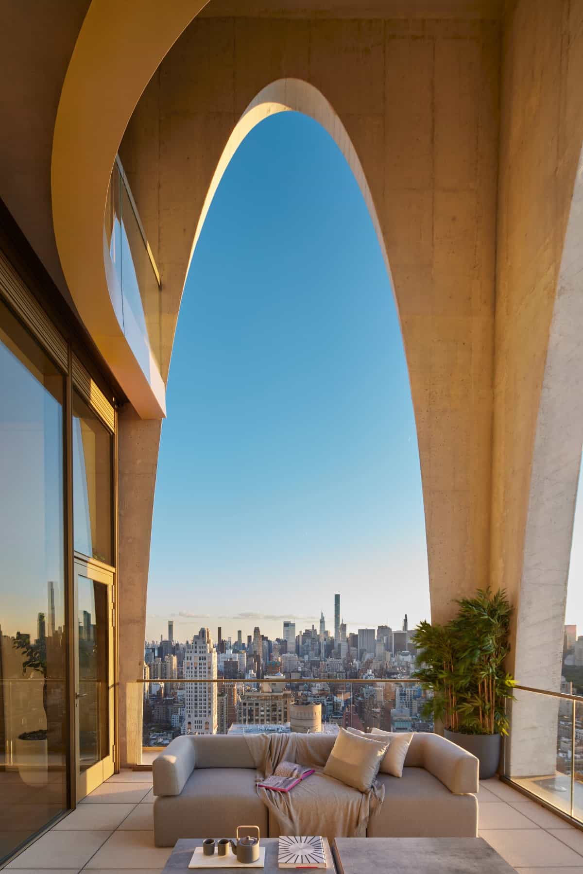 The terrace showcases soaring archways that add visual interest to the home's exterior.