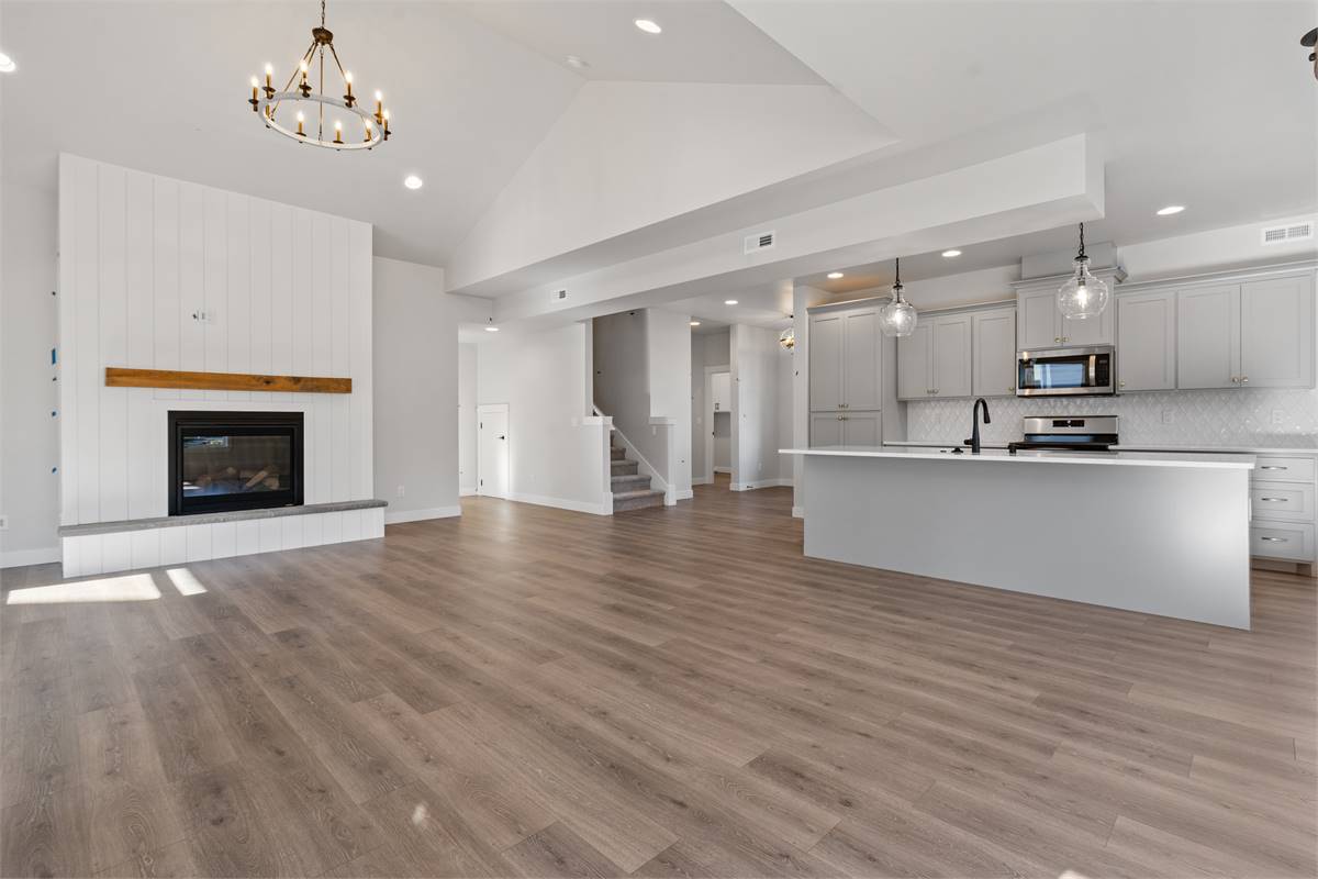 The great room seamlessly flows into the kitchen.