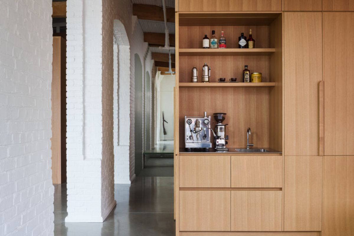 A wooden cabinet with open shelves.