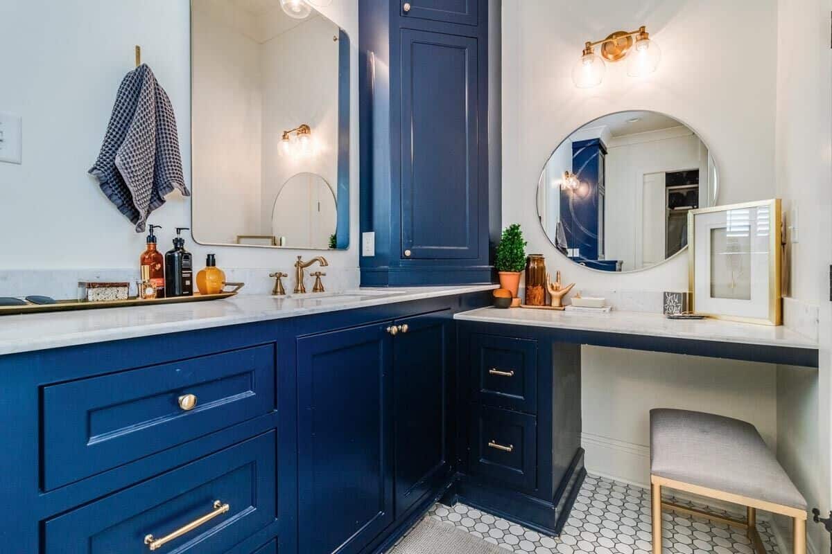 The primary bathroom features double vanities and a built-in makeup counter.