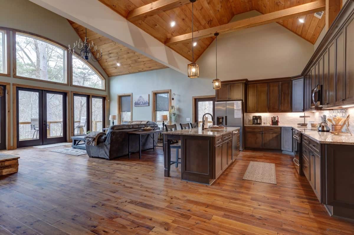 View of the vaulted kitchen and great room from the dining area.