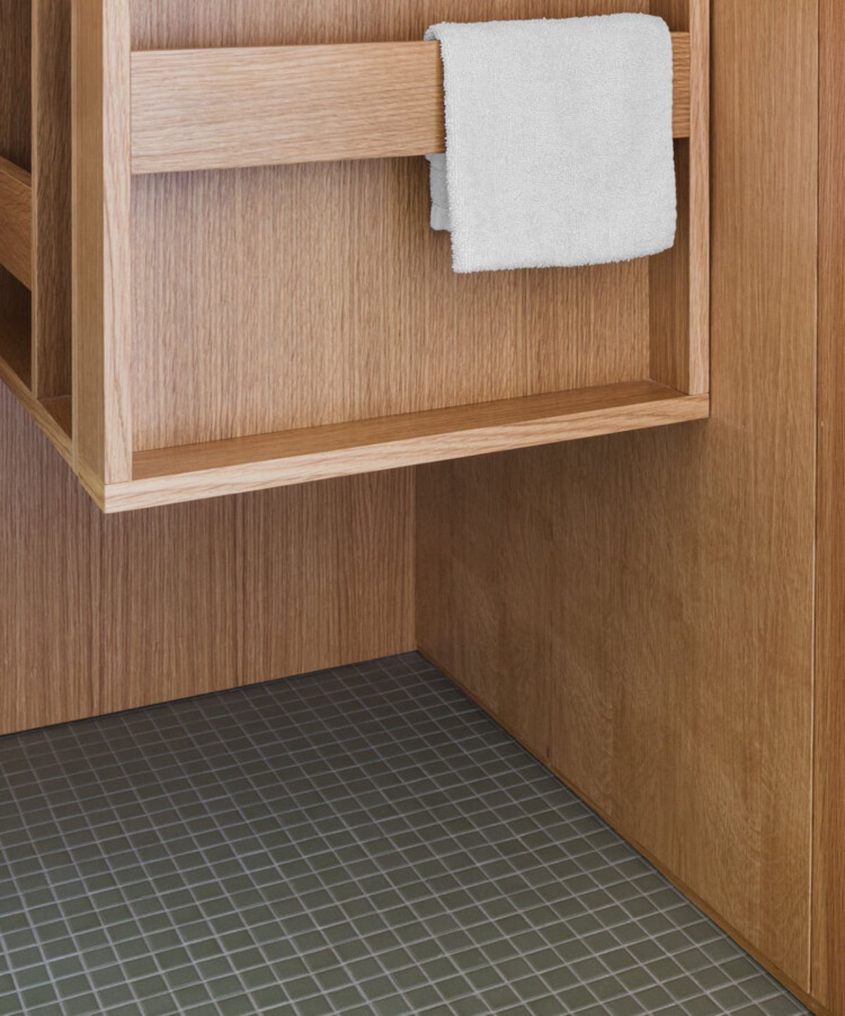 An eco-friendly wooden tissue holder.