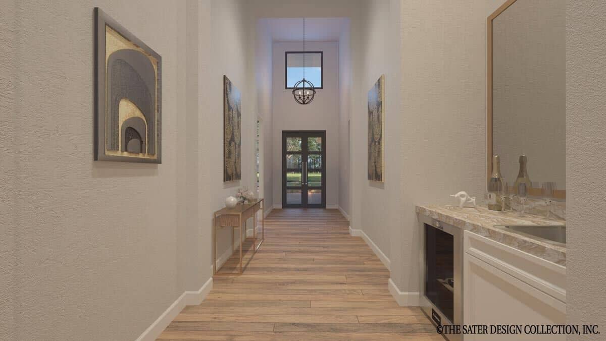 Entry hallway with a French front door, a modern console table, and a wet bar.