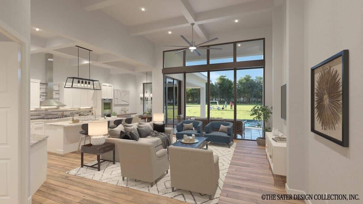 An open layout view of the great room, kitchen, and dining area from the foyer.