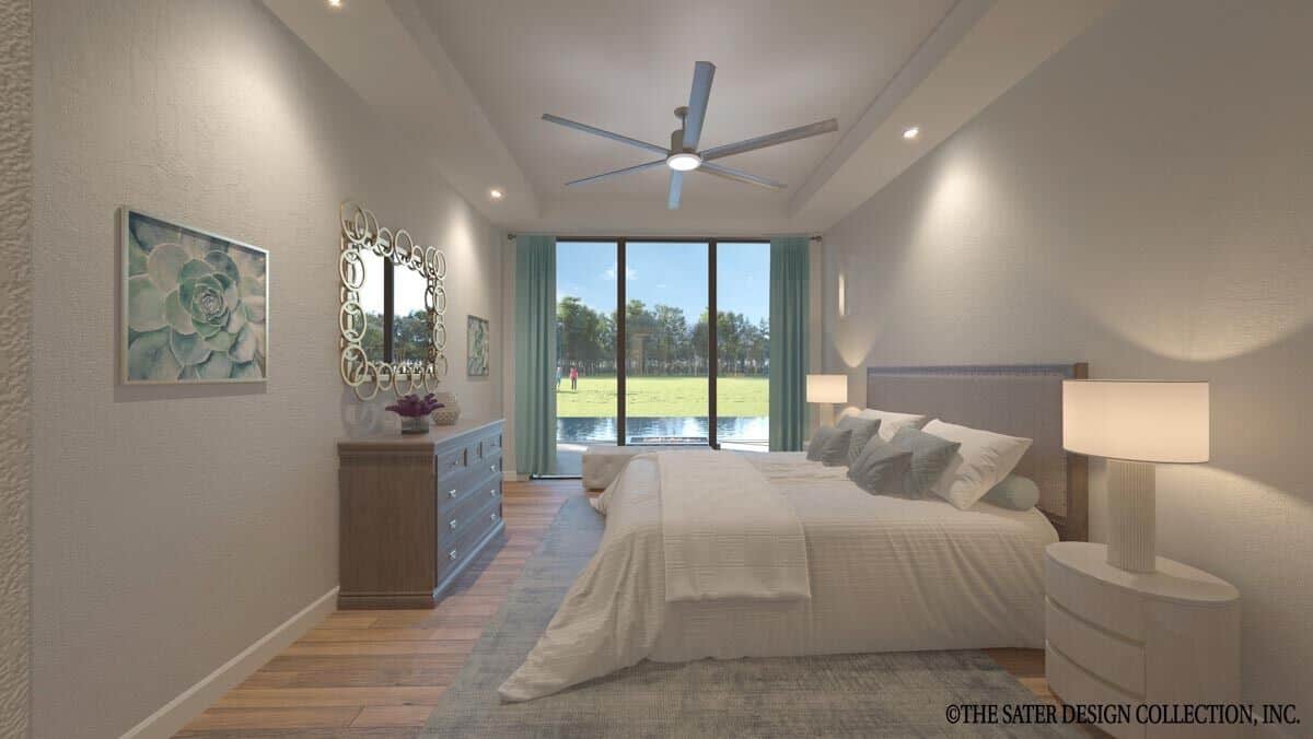 The primary bedroom has a tray ceiling and direct outdoor access through sliding glass doors.