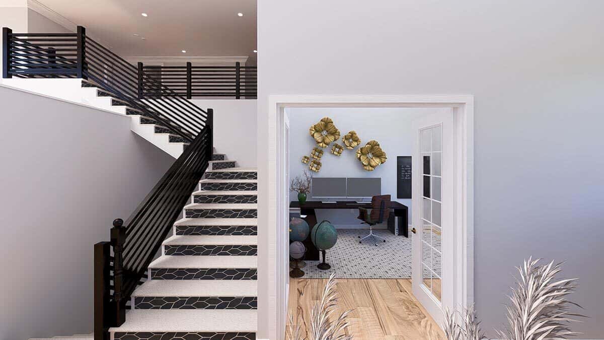 A French door next to the staircase reveals the home office.