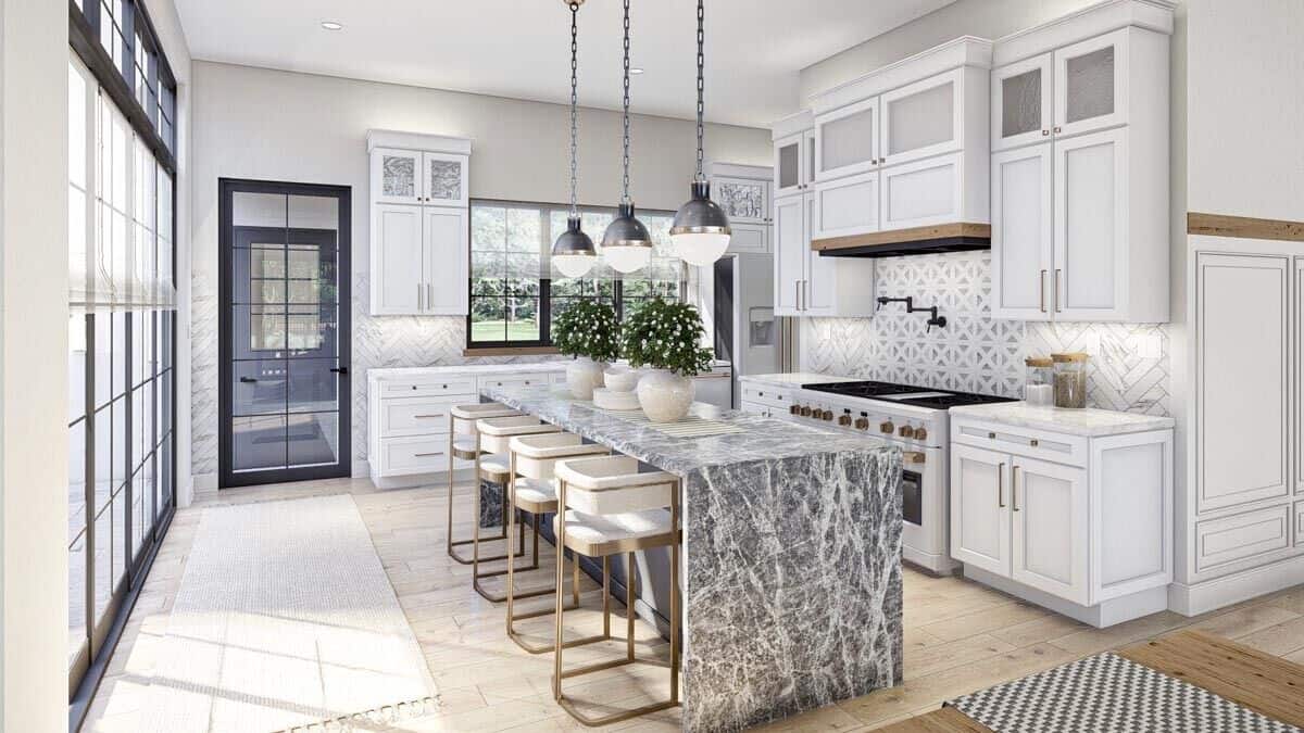 Oversized sliding glass doors extend the kitchen onto a courtyard.