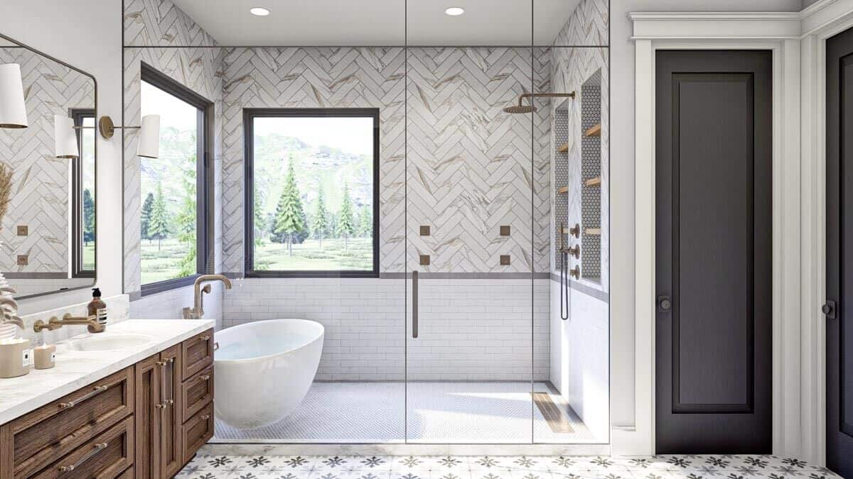 The primary bathroom includes a wet room with brass shower fixtures and a freestanding tub.