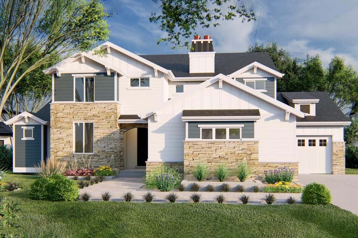 Home's front façade with vertical and horizontal siding, stone accents, and multiple gables accentuated with decorative brackets. 