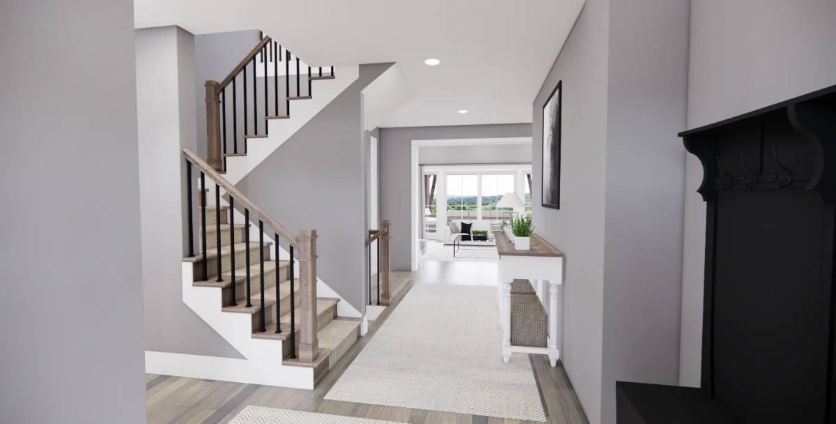 The foyer has a wooden console table and a staircase leading to the secondary bedrooms.