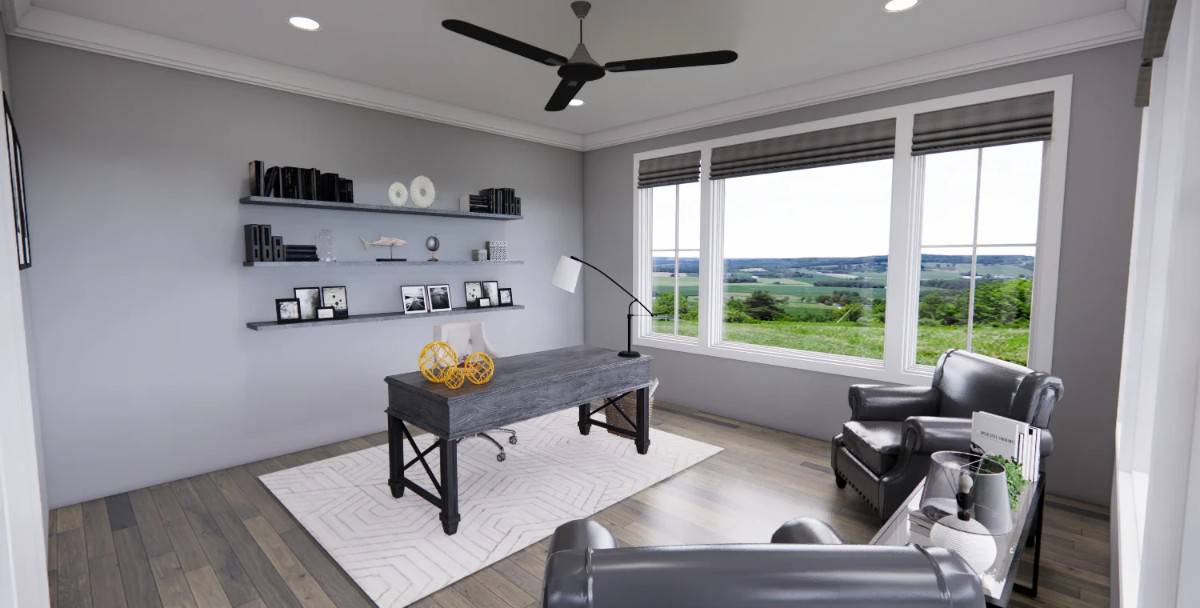 Home office with leather armchairs, a rustic desk, and large windows that look out the backyard.