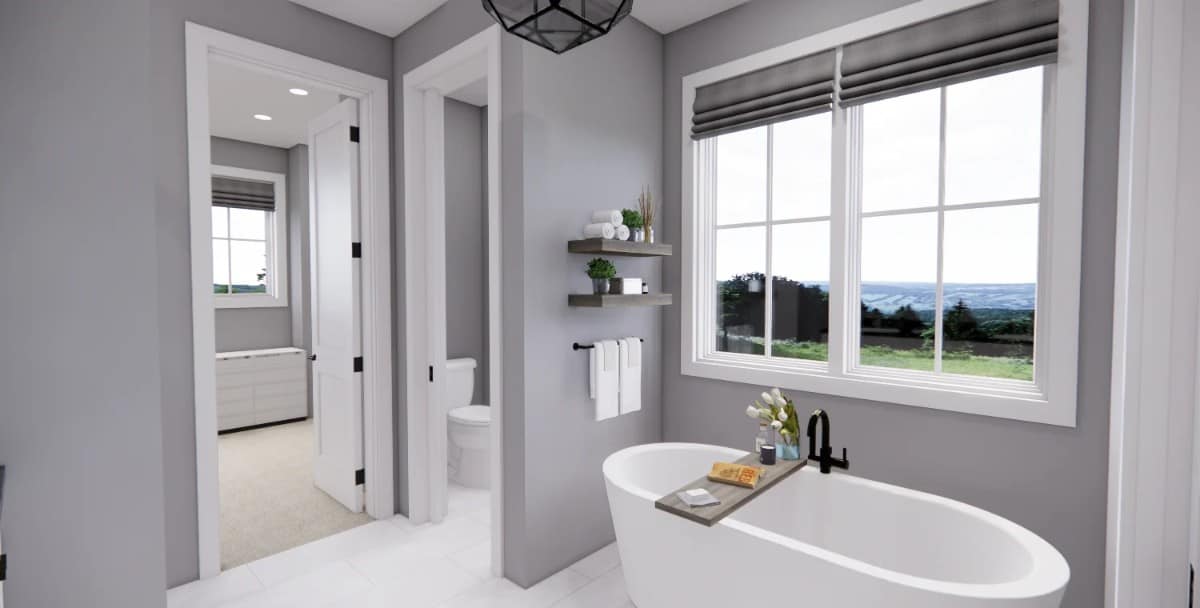 The primary bathroom includes a water closet and a soaking tub illuminated by white-framed windows.