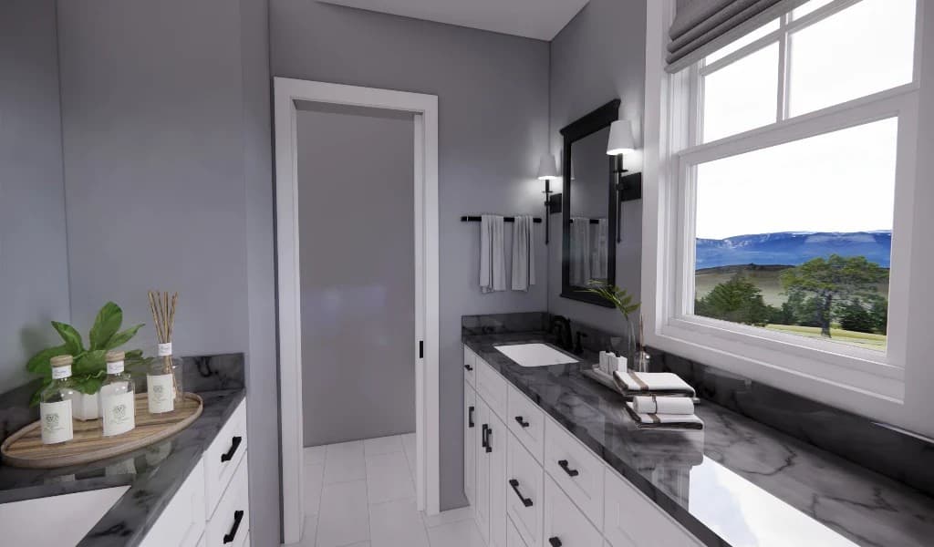 A large window brings natural light into the primary bathroom.