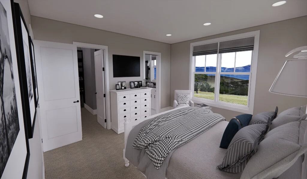 Primary bedroom with a walk-in closet and a spectacular view of the backyard.