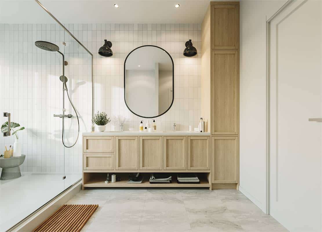 A wooden vanity with two sinks and an attached linen closet completes the primary bathroom.