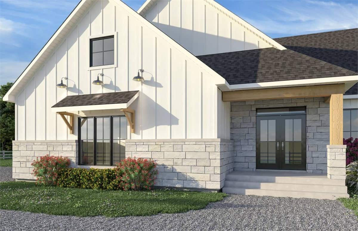 A closer look at the covered entry porch with a French front door.