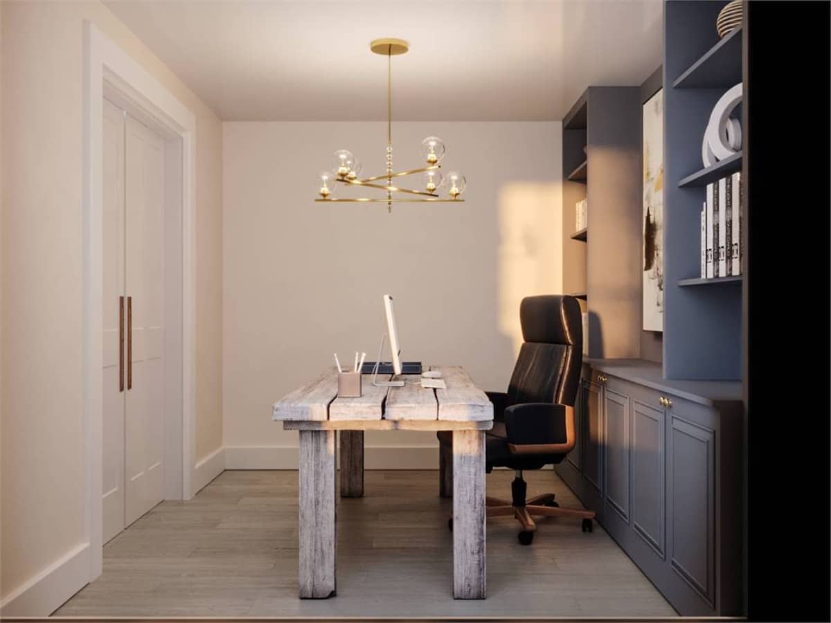 The home office features a built-in cabinet and a rustic desk topped with a brass chandelier.