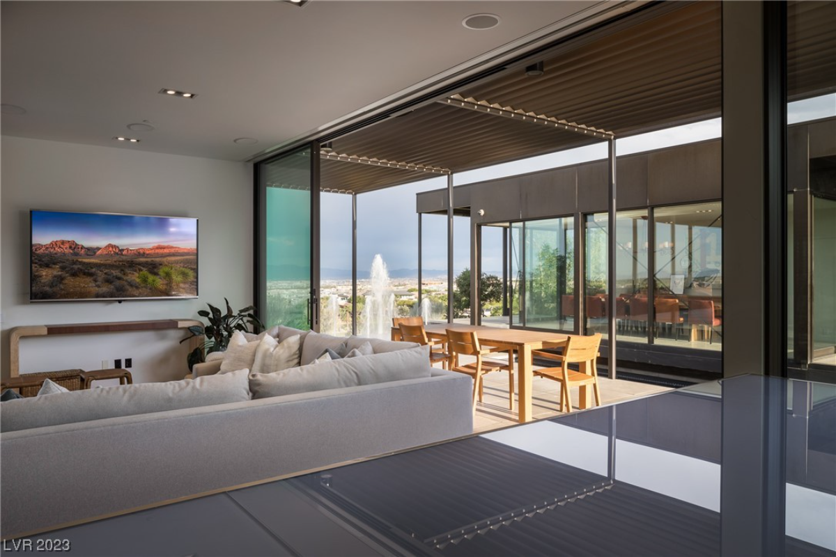 Living room with wooden table and seats on the side