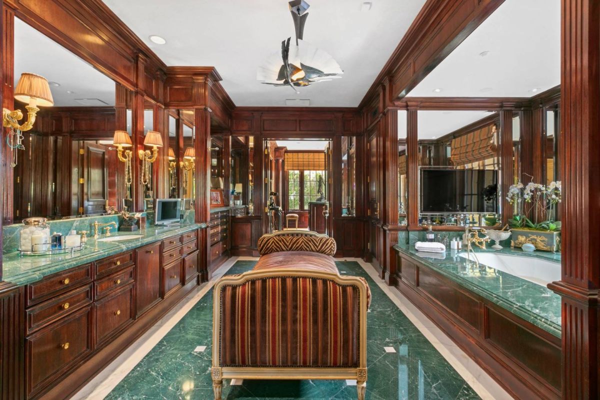 An elegantly designed green bathroom, where tranquility and style coalesce.