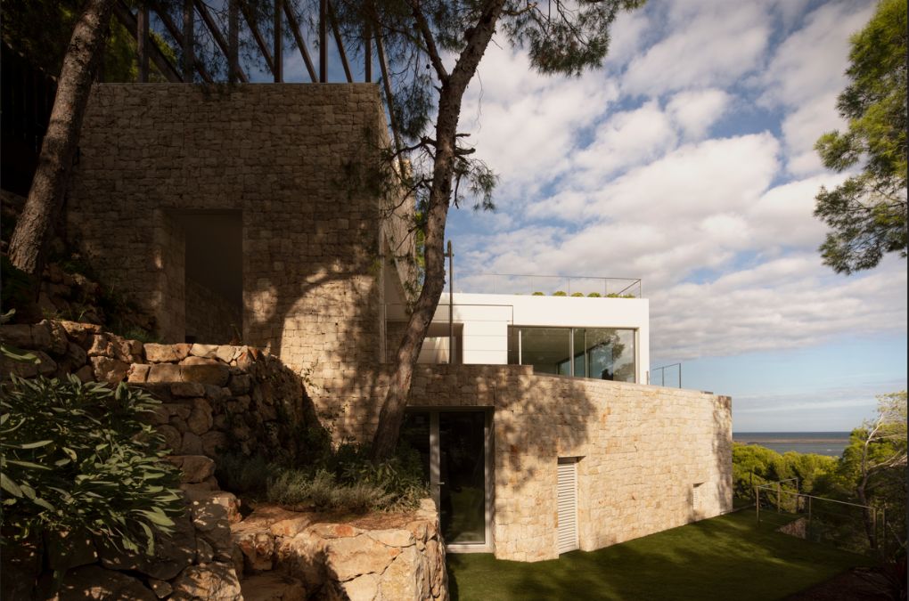 A concrete exterior of the house