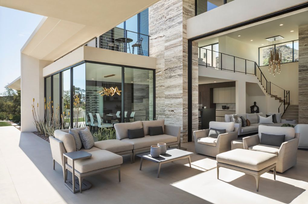 A patio with couch and center table