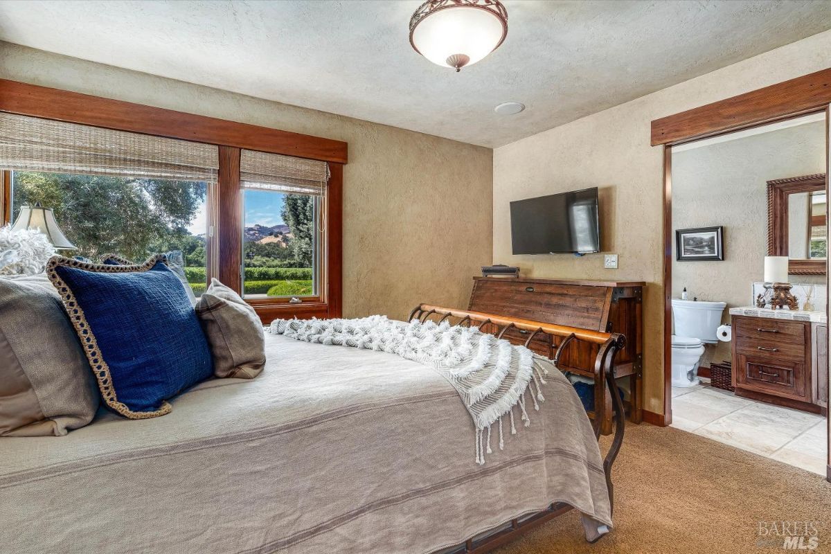 Bedroom with carpet flooring.