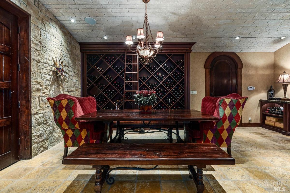 Wine cellar with a table and chairs.