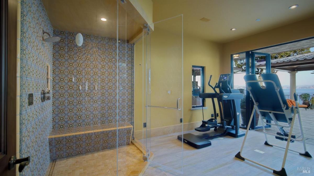 Home gym with shower.