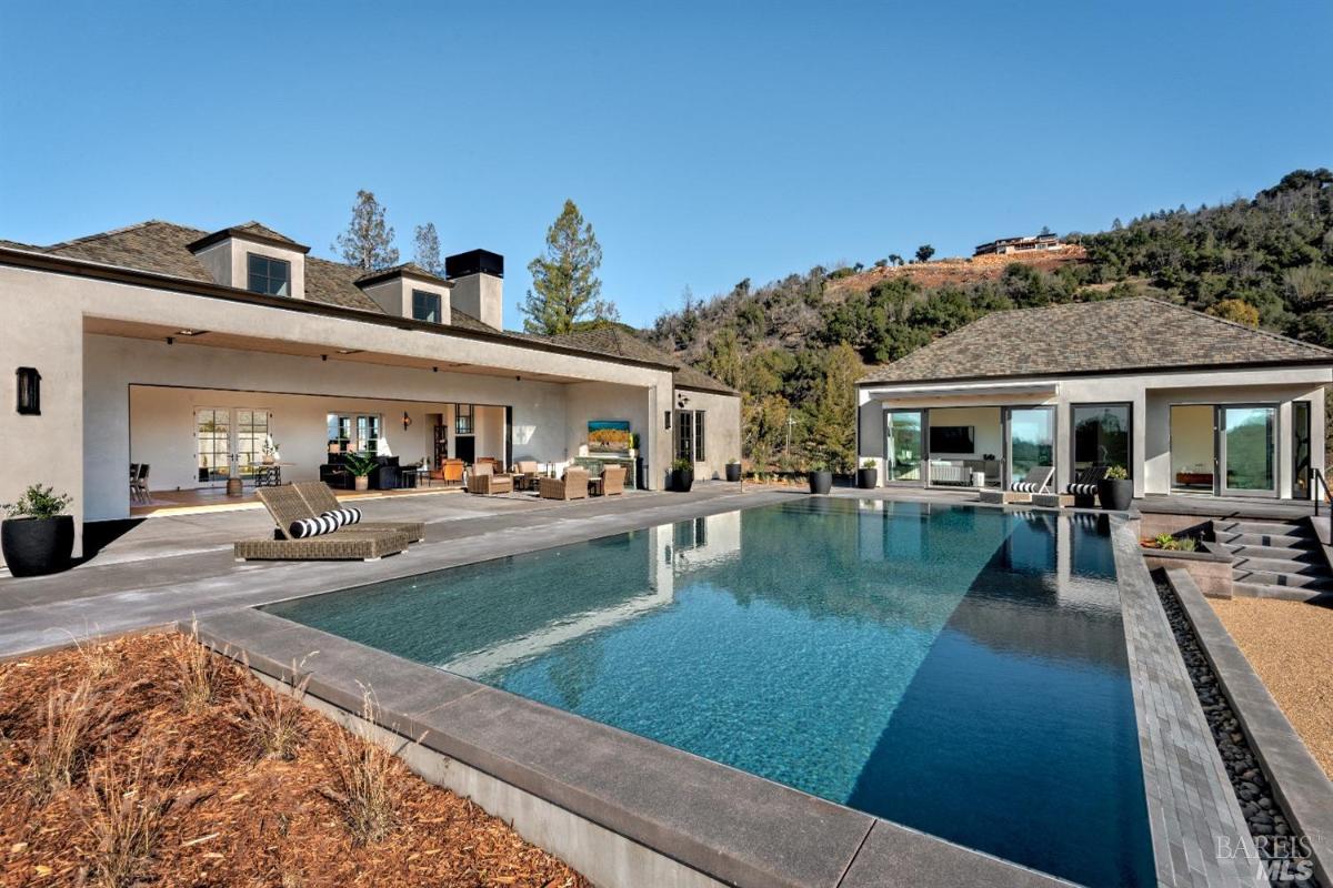 Pool with lounge chairs.