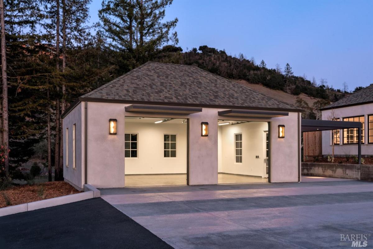 Garage with spacious driveway.