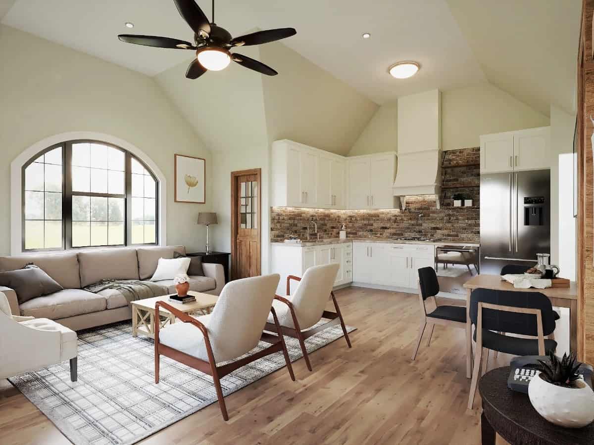 An open layout view of the living room, dining area, and kitchen.