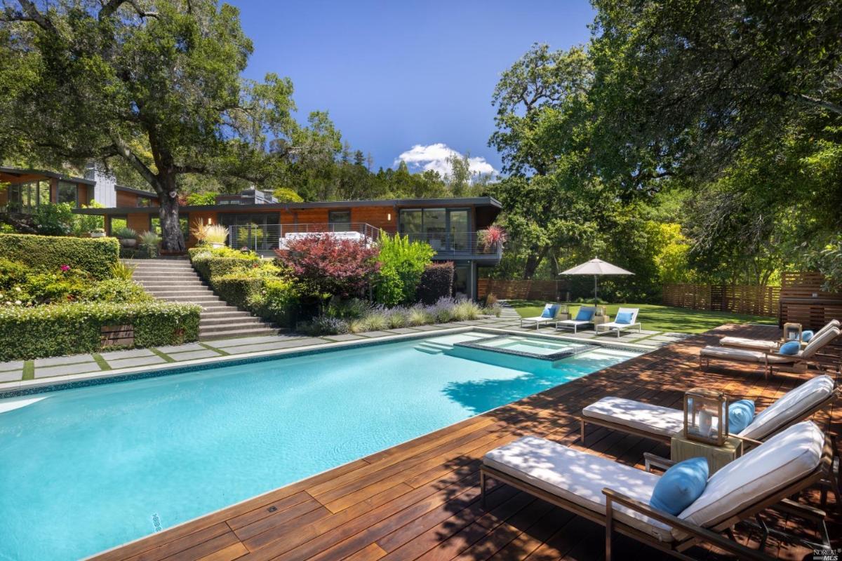 Pool with lounge chairs.