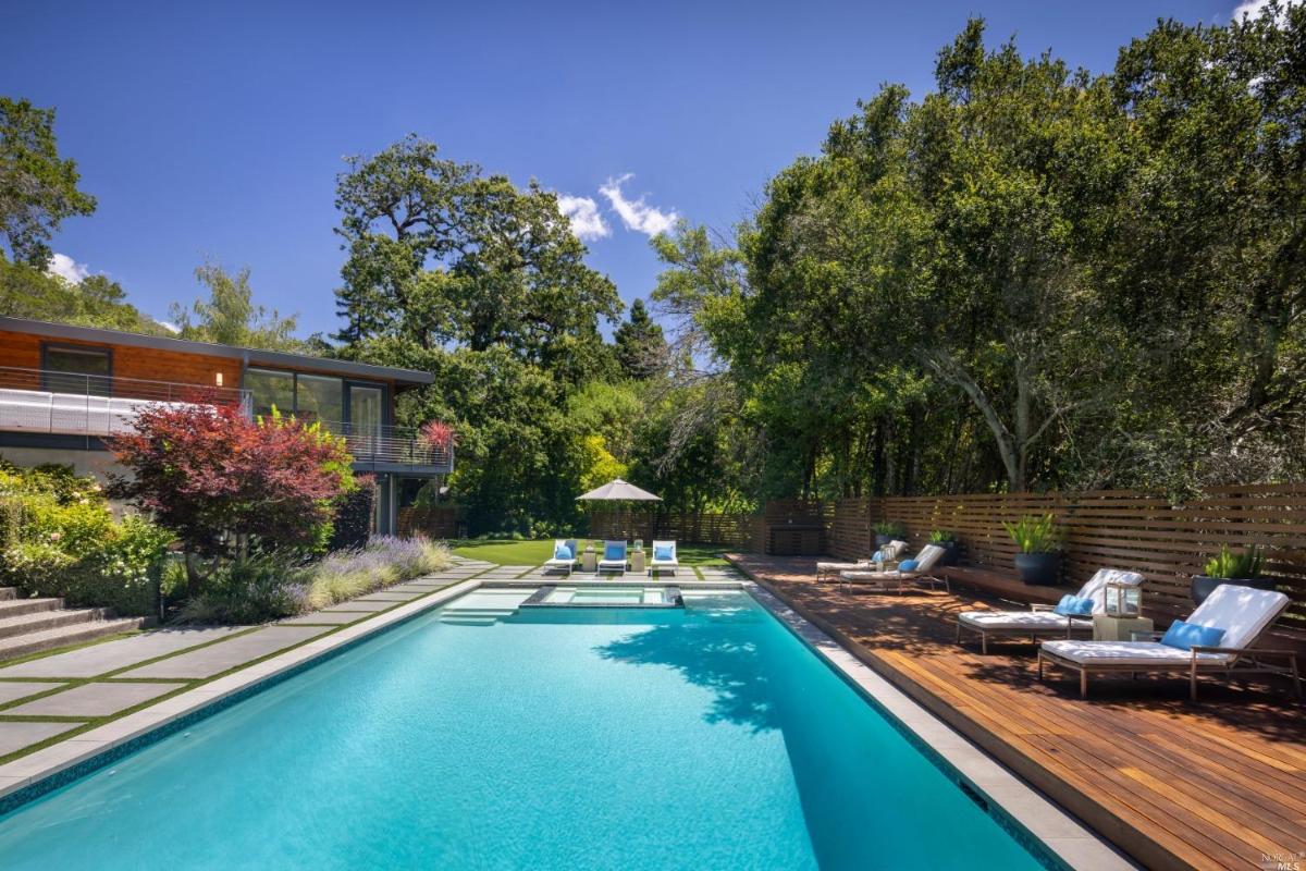 Pool with lounge chairs.