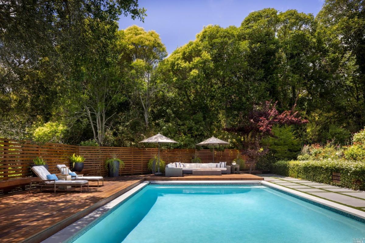 Pool with lounge chairs.