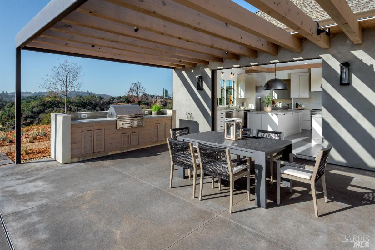 BBQ area with dining table.