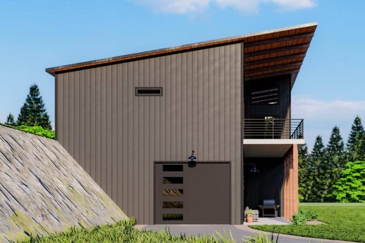 Right view of the house with a drive-through garage and stacked porches.