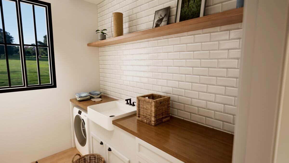 Laundry room with a wooden counter, a vessel sink, and a floating shelf fixed against the subway-tiled backsplash.