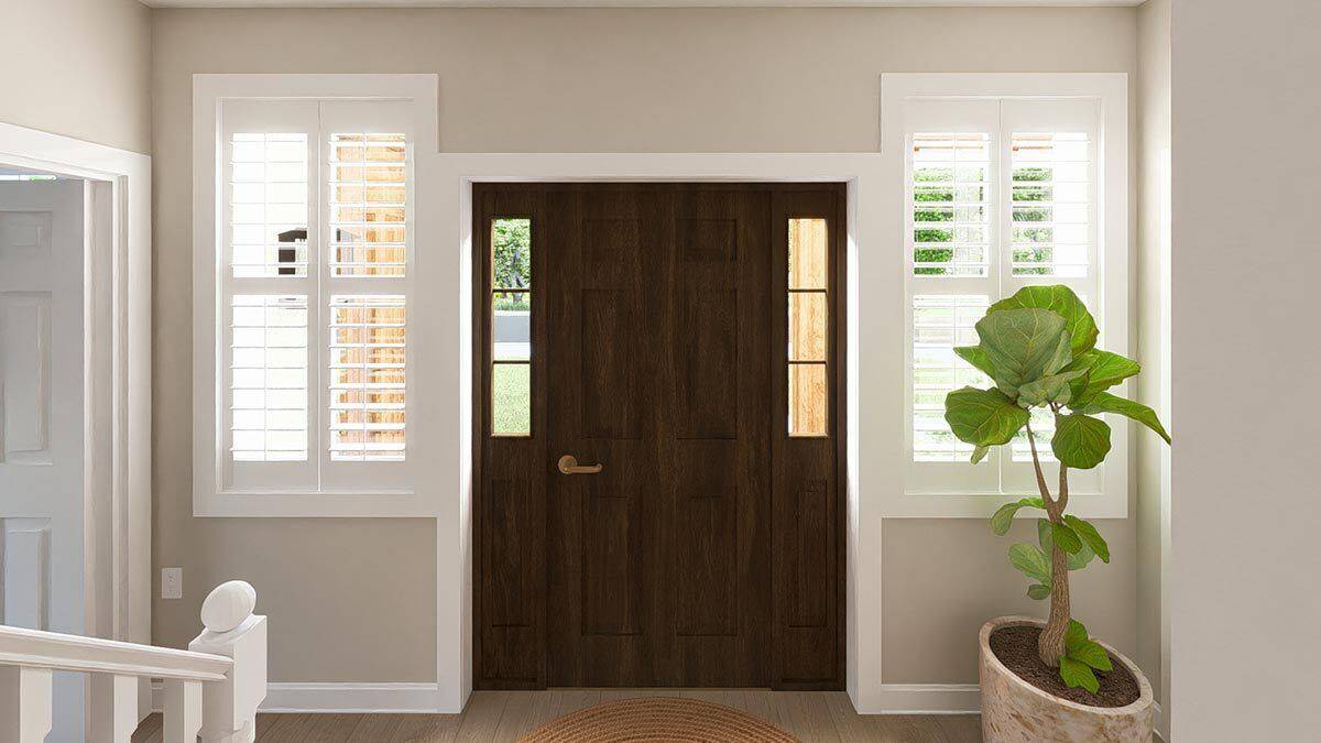 Foyer with a wooden front door flanked by sidelights and louvered windows.