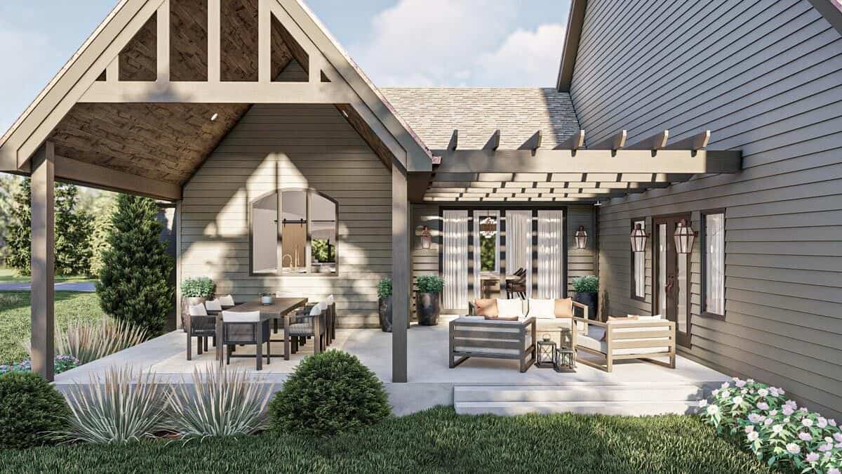 Rear porch topped with gable and pergola roofs.