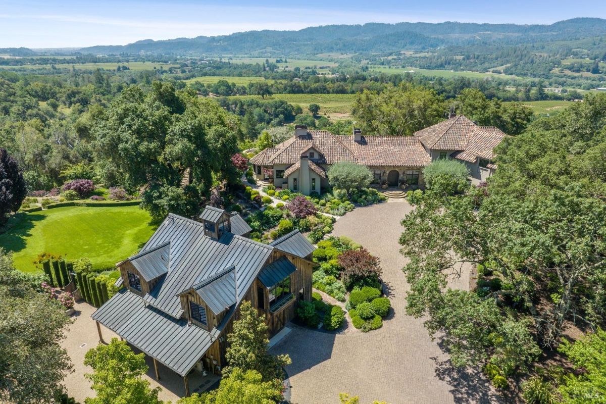 Aerial view of the house and barn.