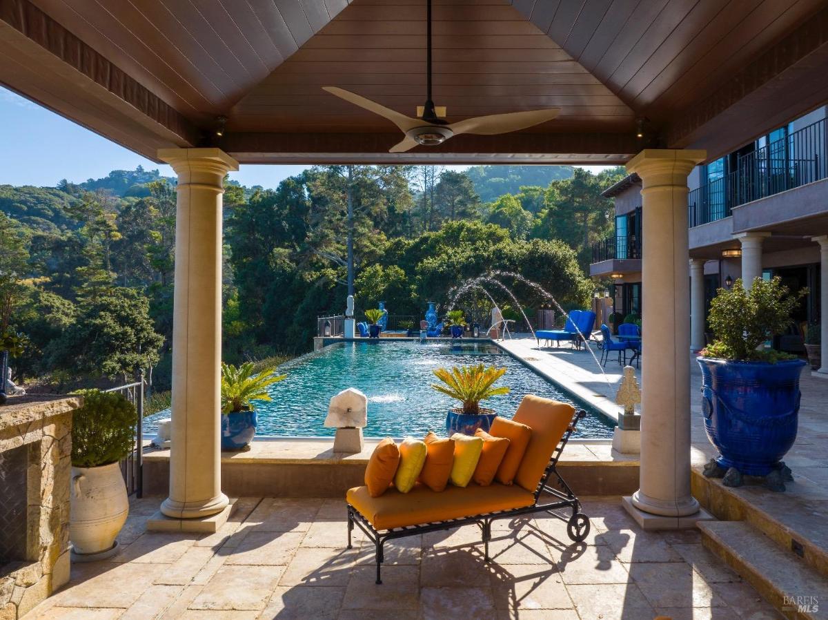 Firepit lounge area next to the pool.