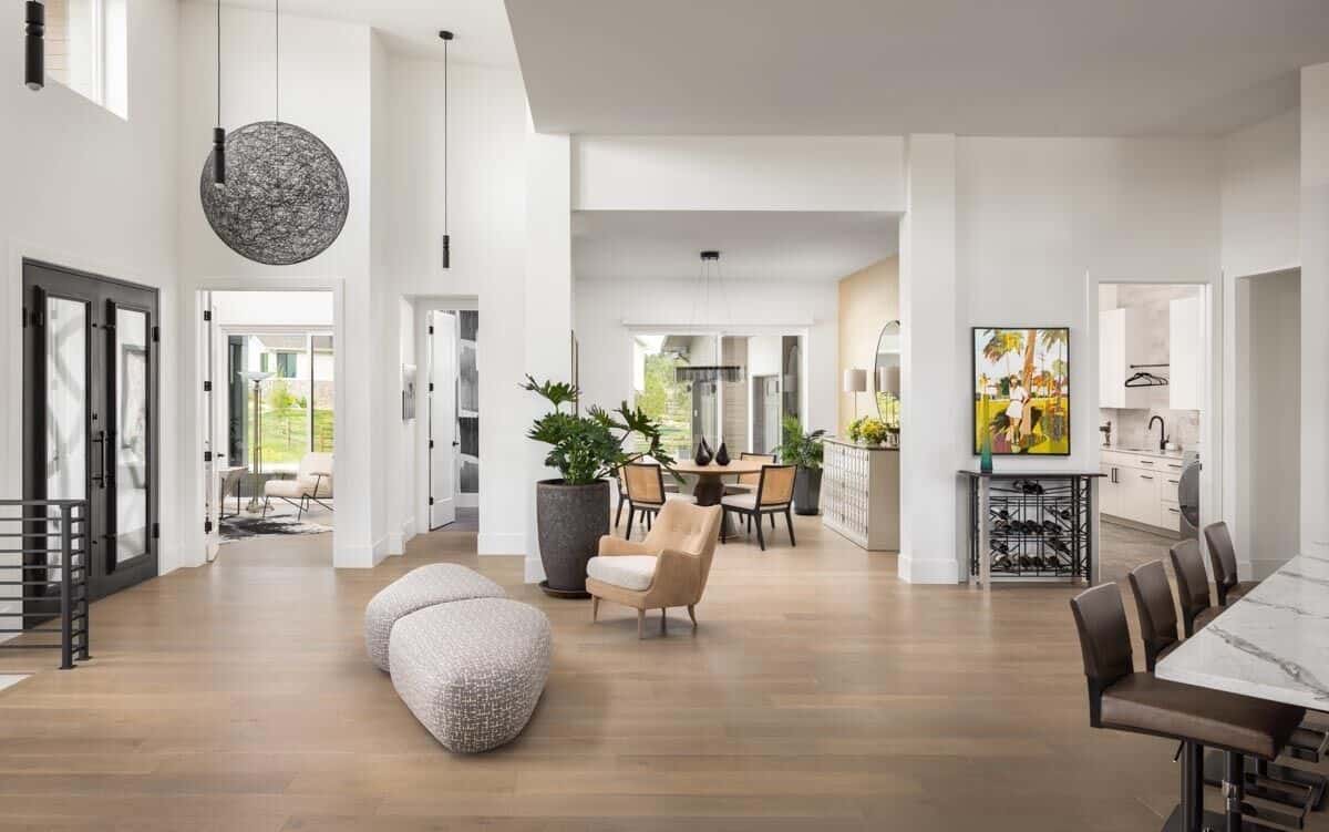 An open layout view of the foyer, kitchen, and dining room.